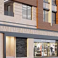 Modern Multi Storey Residential Building With Brown And Beige Facade And Large Windows