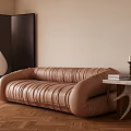 Tan Pleated Three Seater Sofa With Black Room Divider And Wooden Side Table