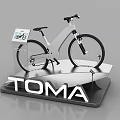 Modern Bicycle on TOMA Display Stand with Information Panel Showing Bike