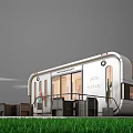Modern Mobile Guesthouse Building With Large Windows Outdoor Seating And Green Lawn