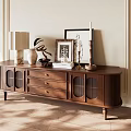 Elegant Wooden TV Stand with Drawers Glass Doors Lamp Vase Plant Frames on Beige Wall
