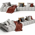 Gray Sectional Sofa With Decorative Pillows And Burgundy Blanket For Living Room