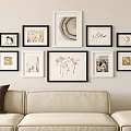 Stylish Photo Wall With Black White Decorative Frames In Neutral Living Room