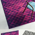 Vibrant Square Carpet With Purple And Pink Triangular Pattern In Living Room With Chair Legs