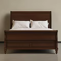 Classic Wooden Double Bed With Carved Headboard And White Sheets In Simple Setting