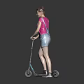 Woman in pink T-shirt and denim overalls shorts riding electric scooter against plain grey background