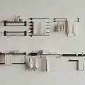 Bathroom Accessories Collection With Black Metal Towel Racks And White Towels