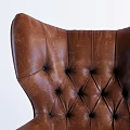 Brown Leather Office Chair With High Tufted Back And Wooden Wheeled Base
