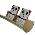 Two Stylish Panda Design Cigarette Packs Displayed in Green Tray