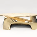 Luxurious Modern Golden Coffee Table With Oval Shaped Top And Sculptural Base