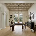Elegant Restaurant Dining Space With Wooden Table Chairs Decorative Wall Art Patterned Ceiling And Herringbone Floor