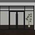Stylish Double Glass Doors With Black Frame And Potted Plant In Modern Interior