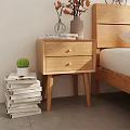 Double Bed With Wooden Headboard White Sheets Brown Throw Blanket And Green Plant