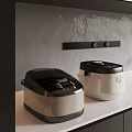 Two Modern Black And White Rice Cookers As Key Kitchen Appliances On Countertop