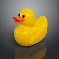 Bright Yellow Rubber Duck With Shiny Surface Orange Beak And Black Eyes