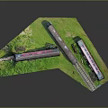 Different Types Of Trains On Rail Tracks In Grass Area