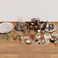 Assorted Beverages Collection with Cups Tea Sets Coffee Makers Glassware and Ceramic Mugs