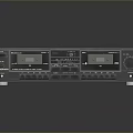 Silver Black Vintage Computer Tape Drive Featuring Multiple Buttons Knobs And Smooth Reflective Surface