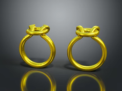 Elegant Gold Rings With Intricate Knot Design And Shiny Surface 3d model