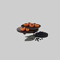 Fresh Persimmons and Blueberries on Wooden and Stone Plates with Gray Cloth