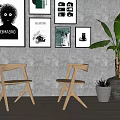 Minimalist Wooden Accent Chairs In Living Room With Decorative Wall Art And Potted Plant