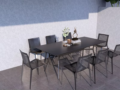 Stylish Black Outdoor Table With Woven Metal Chairs And Decorative Items 3d model
