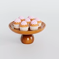Delicious Cupcakes With Pink Cream On Top Brown Round Cake Stand