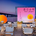 Sunset Splendor Outdoor Dining Space With Tables Chairs Bridge And Water View