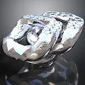 Silver Metallic Decorative Household Item With Intertwined Textured Structure And Shiny Finish