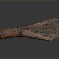 Handmade Brown Broom With Woven Handle And Natural Bristles On Gray Smooth Surface With Reflection