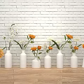 White Brick Wall Background With Wooden Floor And Multiple White Vases Holding Orange White Flowers