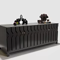 Black Entryway Console Cabinet With Geometric Design And Decorative Elephant Figurines Purple Flowers