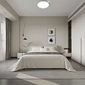 Modern Bedroom Interior With Bed White Quilt Bedside Tables Framed Artworks And Built In Wardrobe
