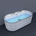 White Oval Shaped Ribbed Bathtub With Blue Water And Silver Faucet