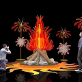 Eye Catching Flame Sculpture Photo Spot With Decorative Lights And People Taking