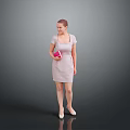 A Woman in Pink Checkered Dress Holding Pink Notebook Standing on Grey Background