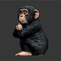 Detailed Black Chimpanzee Figurine Sitting With Hand on Chin in Thoughtful Pose