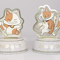 Two Decorative Cartoon Cat Ornaments Different Poses With Silver Glitter Base And Golden Accents