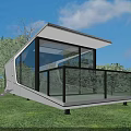 Modern Guesthouse Building With Geometric Exterior Large Glass Windows Green Lawn and Trees