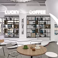 Lucky Coffee Cafe Modern Interior With Bookshelves Round Wooden Tables Chairs And White Pendant Lights