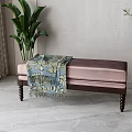 Upholstered Light Pink Sofa Bench with Wooden Legs Floral Blanket and Indoor Plants