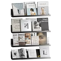 Various Fashion and Design Magazines Books Arranged on Modern Metal Shelf