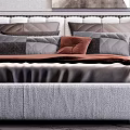 Modern Bedroom Interior with Gray Double Bed Pillows Abstract Artwork Bookshelf and Floor Lamp