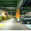 Indoor Parking Garage With Green And Yellow Pillars Ceiling Grid Floor Arrows And Parked Cars