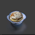 Delicious Homemade Muffin Topped With Powdered Sugar In Floral Shaped Blue And White Bowl