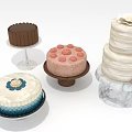 Variety Of Decorated Cakes Including Chocolate Pink Multi Layered White And Gradient Designs On Stands