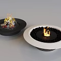 Round Black and White Fire Pits With Burning Flames And Black Pebbles