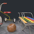 Children's Playful Toys With Tricycle Colorful Sled And Brown Ball