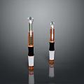 Dual Cylindrical Tools Featuring White Black Copper Sections And Transparent Tops