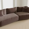 Brown Velvet Abstract Shape Sofa With Cozy Cushions In Natural Light On Light Wooden Floor